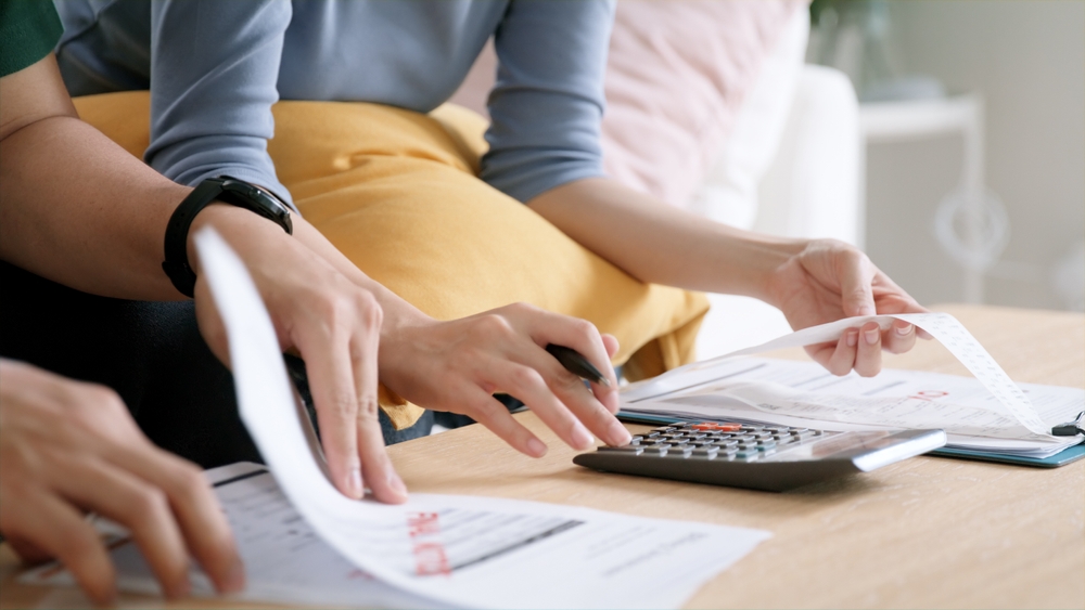 a couple calculating business taxes after the increases in 2024